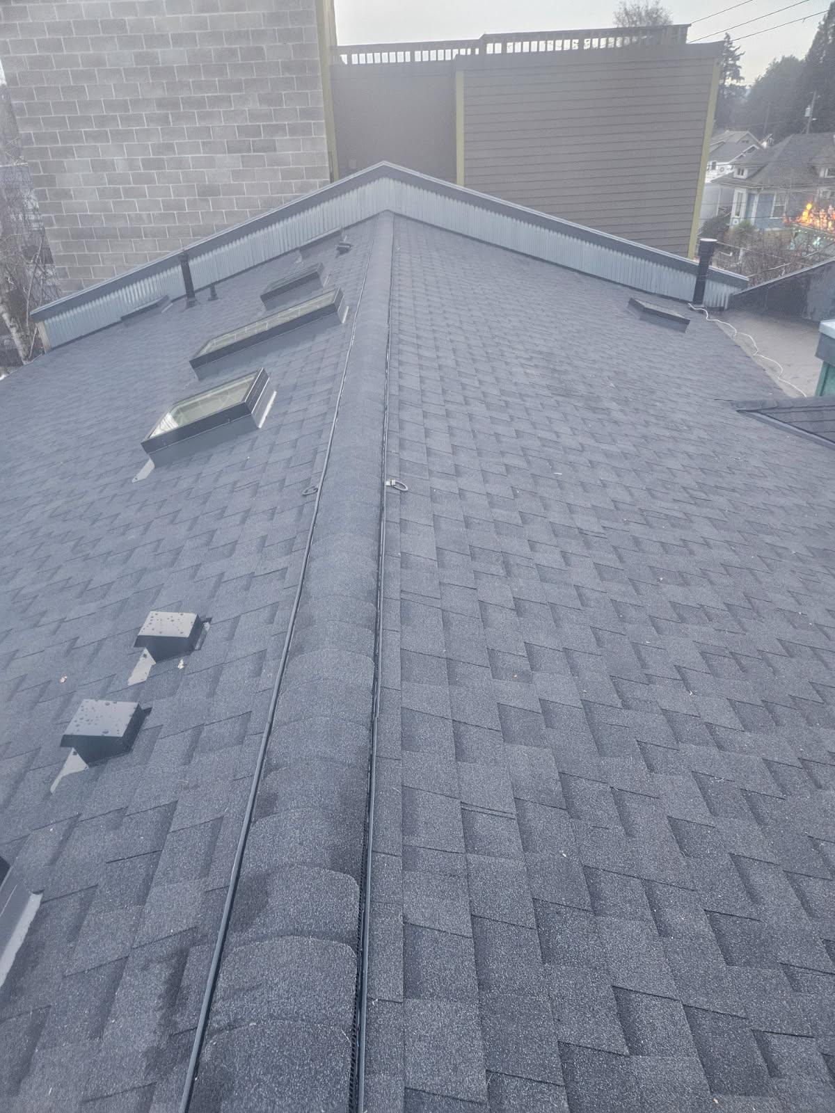 A nice re-roof with a ridge vent ventilation system to avoid mold or condensation.